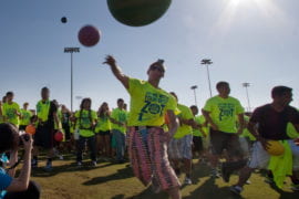 A student throwing a dodgeball