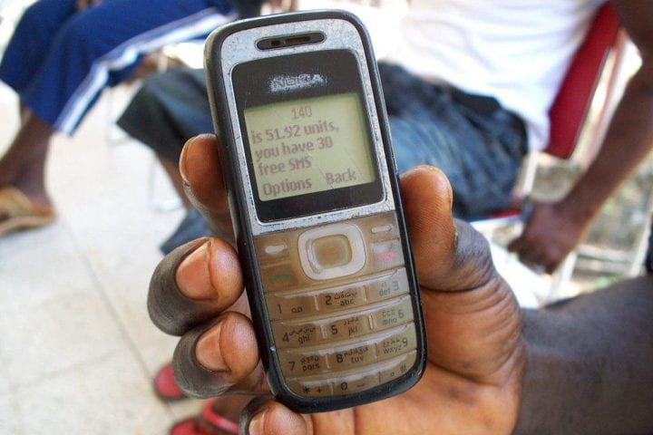 Sierra Leone resident transfers funds via cell phone