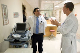 Marco Angulo chats with ultrasound fellow Dr. Brent Becker