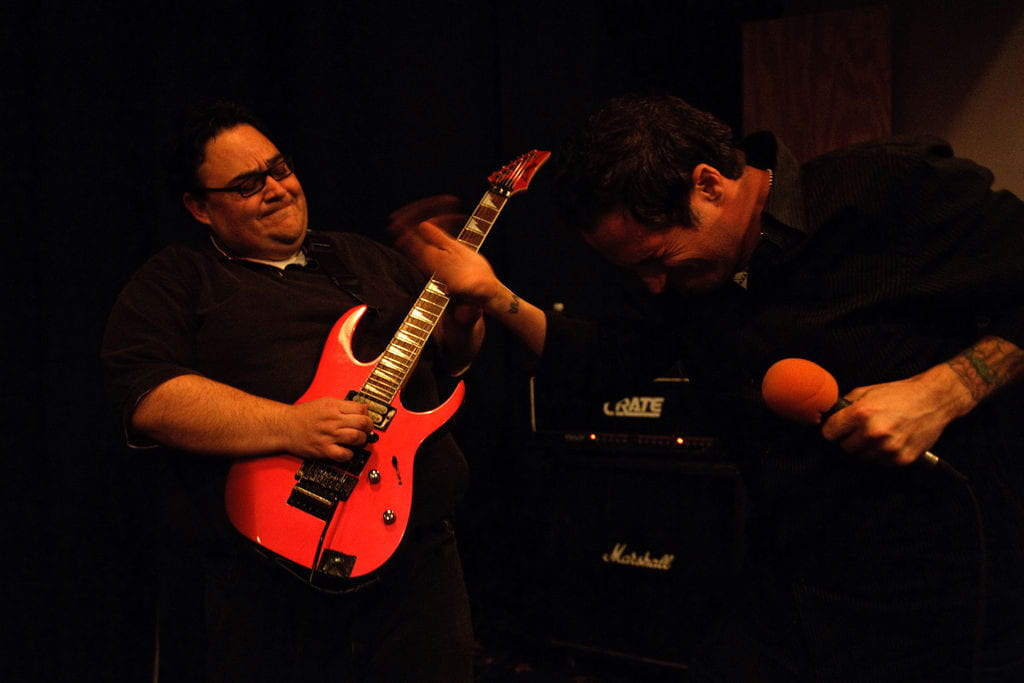 Marco Angulo playing guitar