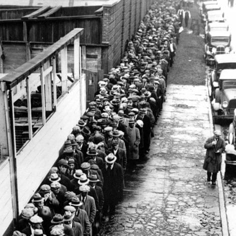 Line of men waiting for free meals during the Great Depression