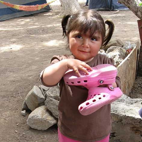 Little girl who received a pair of shoes