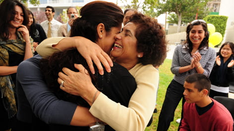 Sarah Lopez receives a hug from her mother, Esthela