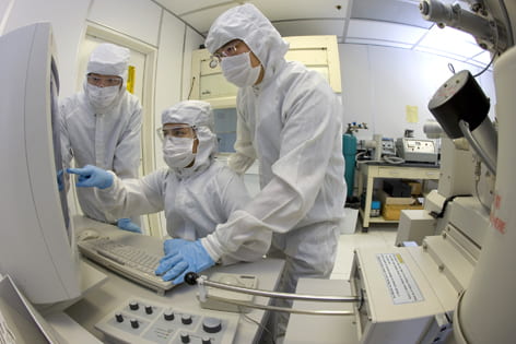 Scientists use environmentally controlled clean rooms to manufacture a variety of products