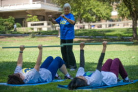 Olga Connolly leads a workout class in Aldrich Park