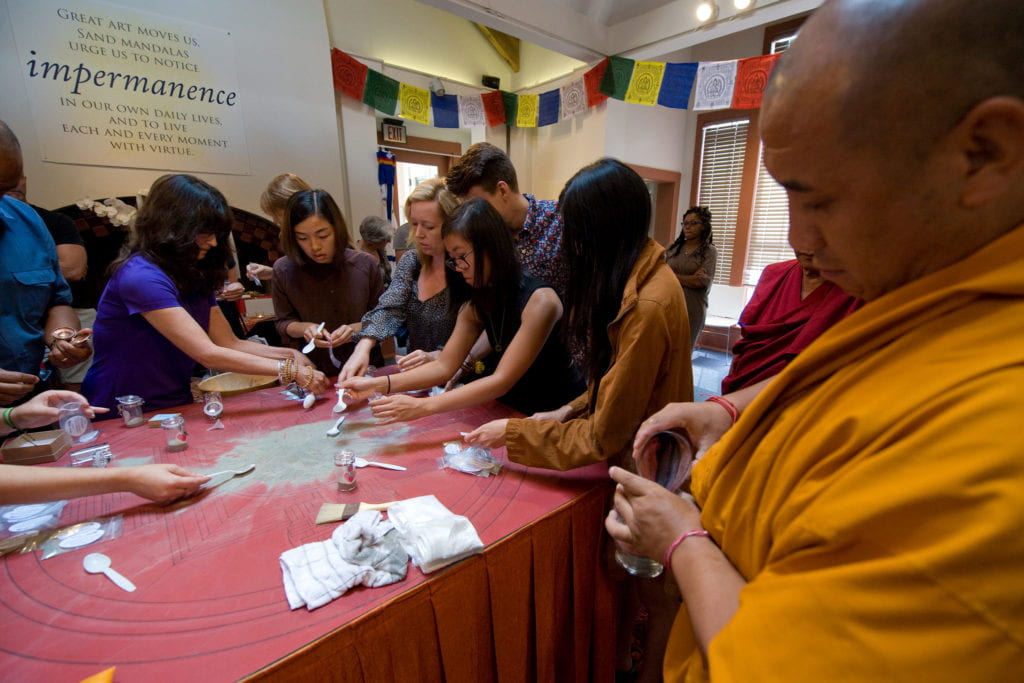 UCI students, campus officials, representatives from the Center for Living Peace, and Friends of the Dalai Lama witnessed and participated in the mandala dissolution ceremony.