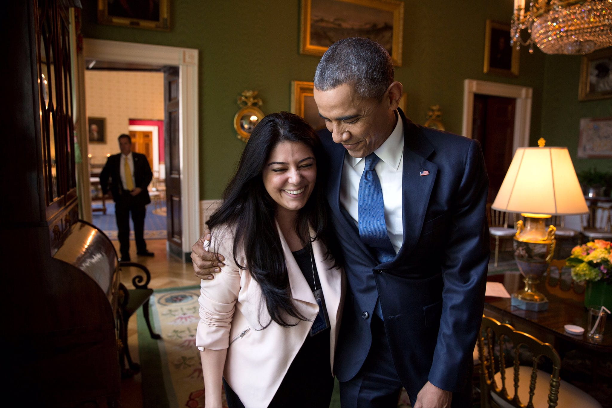 President Barack Obama and UCI alumna Ferial Govashiri