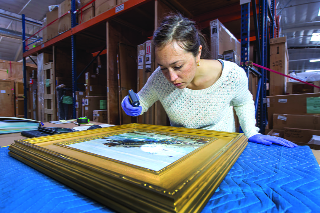 Assistant Museum Registrar Chanelle Mandell catalogs the Buck collection