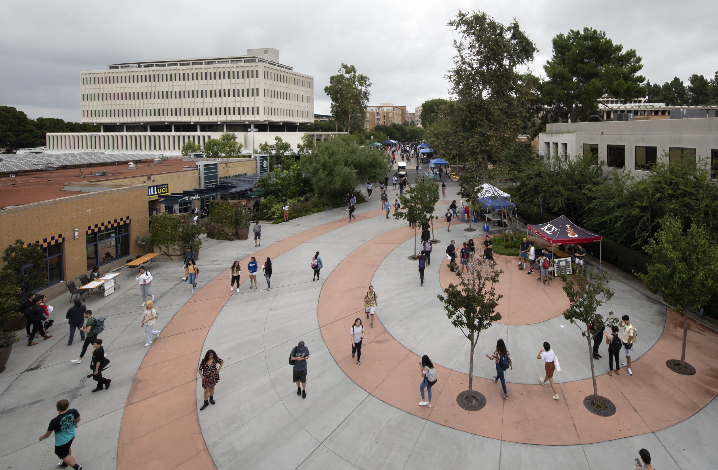 UCI campus: first day of fall classes in 2019, students walking near the student center.