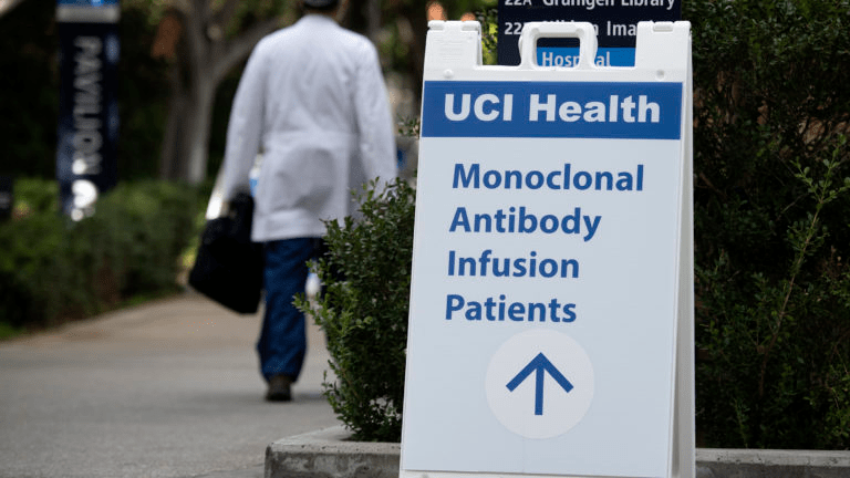 A sign directs patients to monoclonal antibody infusion therapy at UCIMC