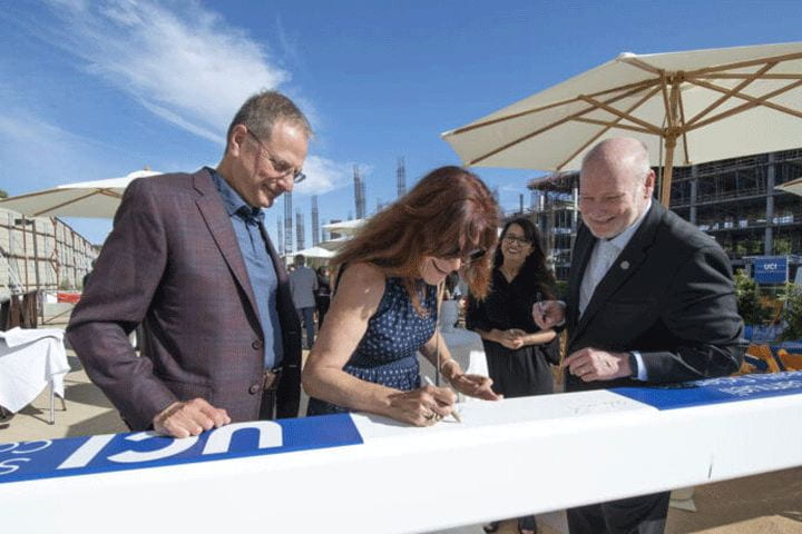 UCI hosts topping-out ceremony for Susan & Henry Samueli College of Health Sciences