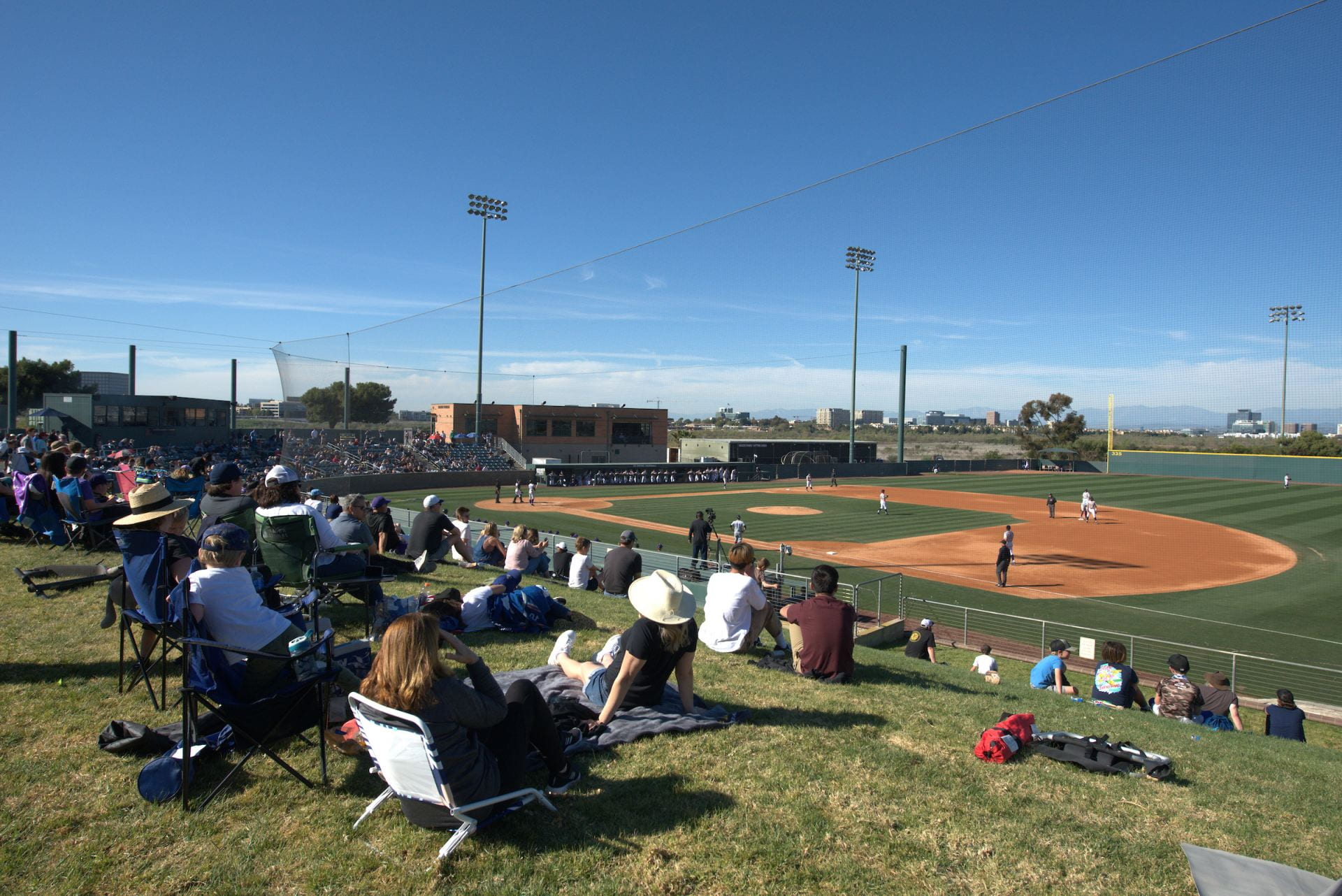 Spectators watching a baseball game at Anteater Ballpark