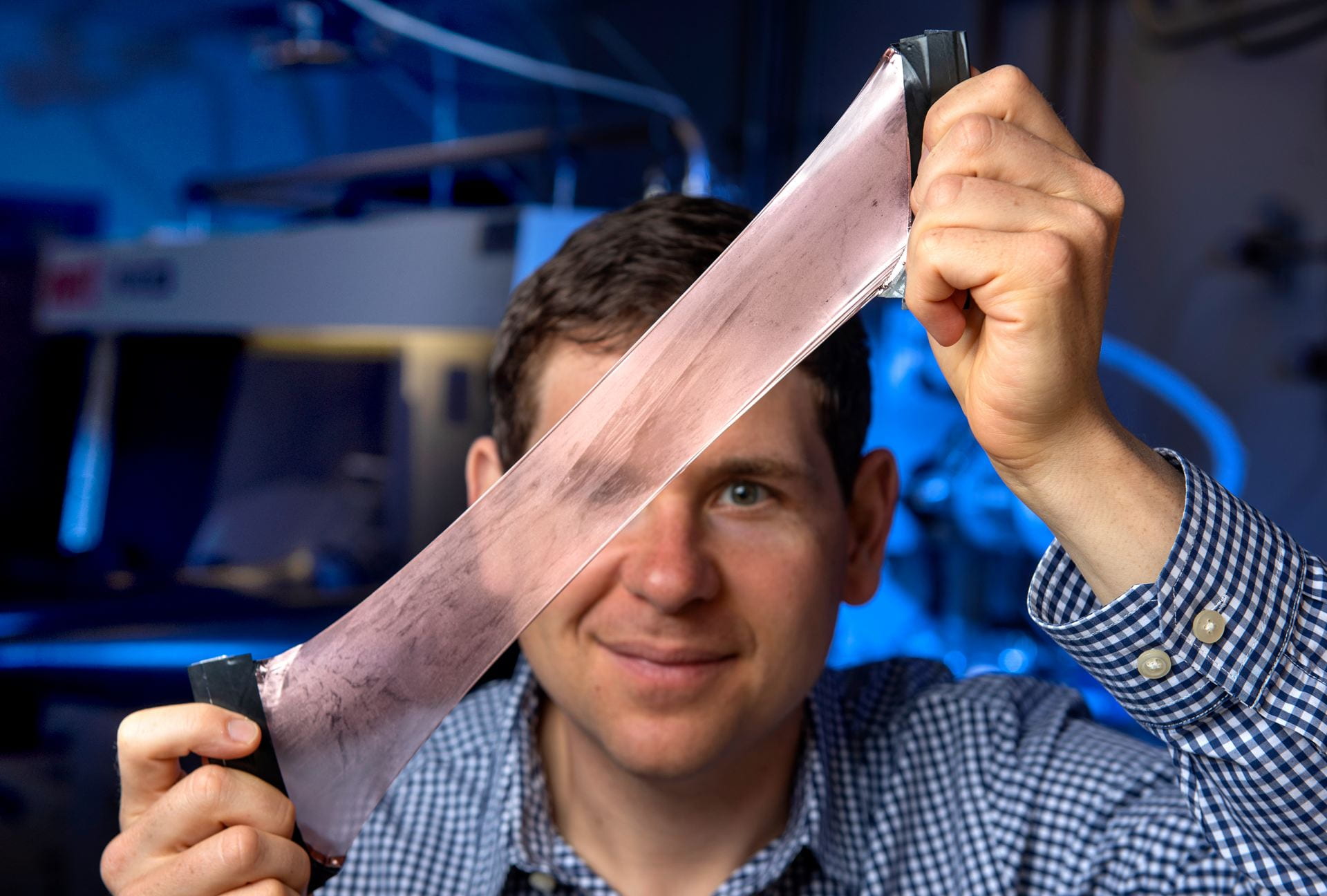 Alon Gorodetsky shows off the adaptive heat-managing composite material his lab developed that is nicknamed after its inspiration: squid skin.