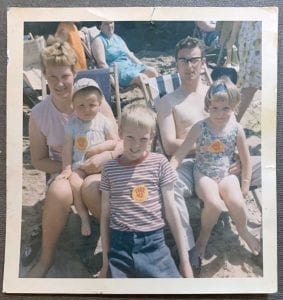 The future Nobel laureate (on his mother’s lap) with his parents, Bill and Mary; brother, Iain; and sister, Lorraine; on the beach in Scotland.