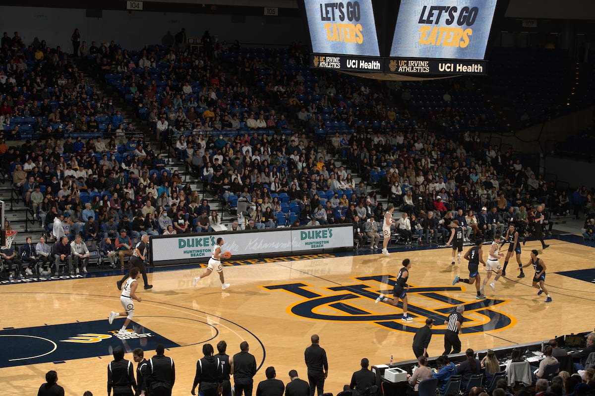 UCI men's basketball team playing at the Bren Event Center.