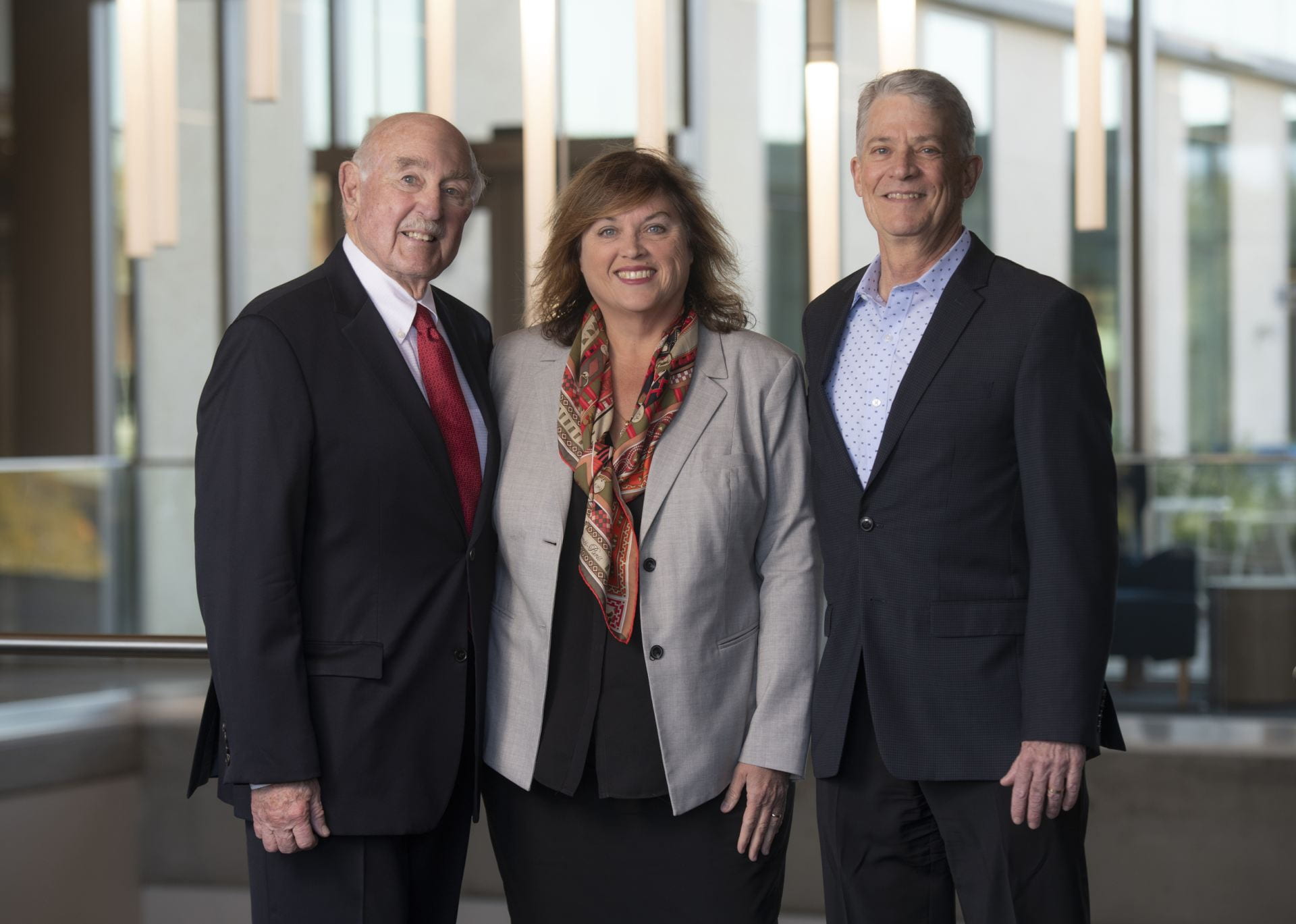 UCI’s Bernadette Boden-Albala, center, pictured with Irvine Health Foundation Board Chair Timothy L. Strader Sr., left, and President Edward B. Kacic, right.