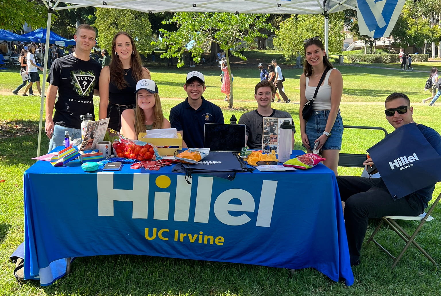 Students staffing the Hillel at UCI table at the fall 2022 Anteater Involvement Fair are (from left) Shahar Broner, Shani Kirson, Isabella Fuiks, Daniel Stepanov, Jacob Schreiber, Sandra Ossman and Yoav Weber.