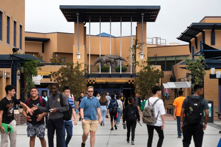 Students walk along the student center terrace during the first day of fall classes on the UCI campus.