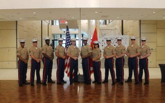 United States Marine Corps veteran and UCI sociology alumnus Andrew Truong ’23 (fourth from right), pictured with fellow service members.