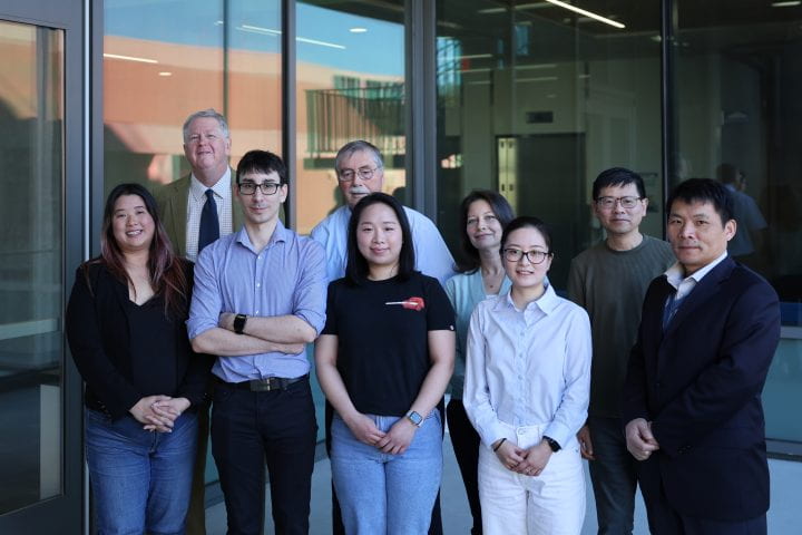 The UCI School of Medicine team members who helped develop new viral vectors that will advance neural circuit mapping include, from left, front row: Michele Wu, Alexis Bouin, Ginny Wu, Qiao Ye and Xiangmin Xu; back row: Todd Holmes, Bert Semler, Orkide Koyuncu and Liqi Tong.