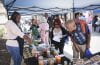A UC master gardener at one of the fair booths offers expert advice on using herbs and plants to promote health and well-being.