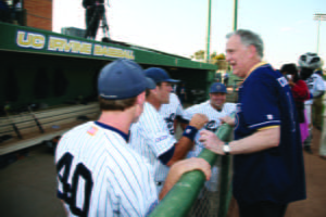 Ralph Cicerone mingles with UCI baseball players on May 19, 2009, during the dedication of Cicerone Field, named after the driving force who helped reinstate baseball in 2002 and once played varsity himself at MIT. UCI archives