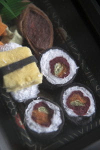 Faux sushi made from lint.